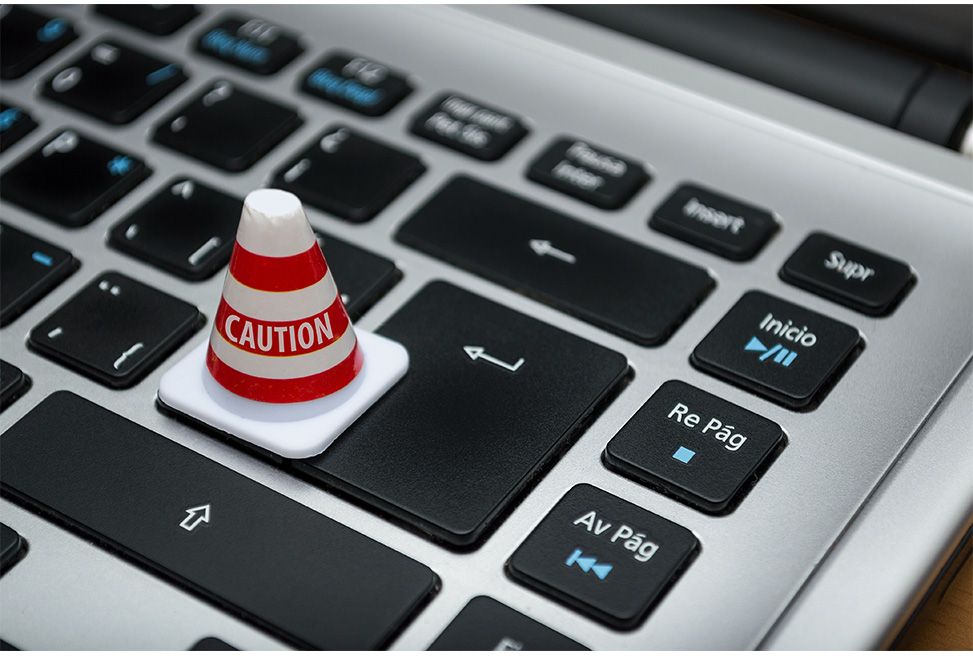 https://www.pexels.com/photo/white-caution-cone-on-keyboard-211151/